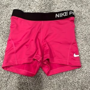 Hot pink womens nike pro’s